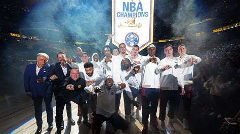 'We are world champions': Fans celebrate Nuggets banner-raising